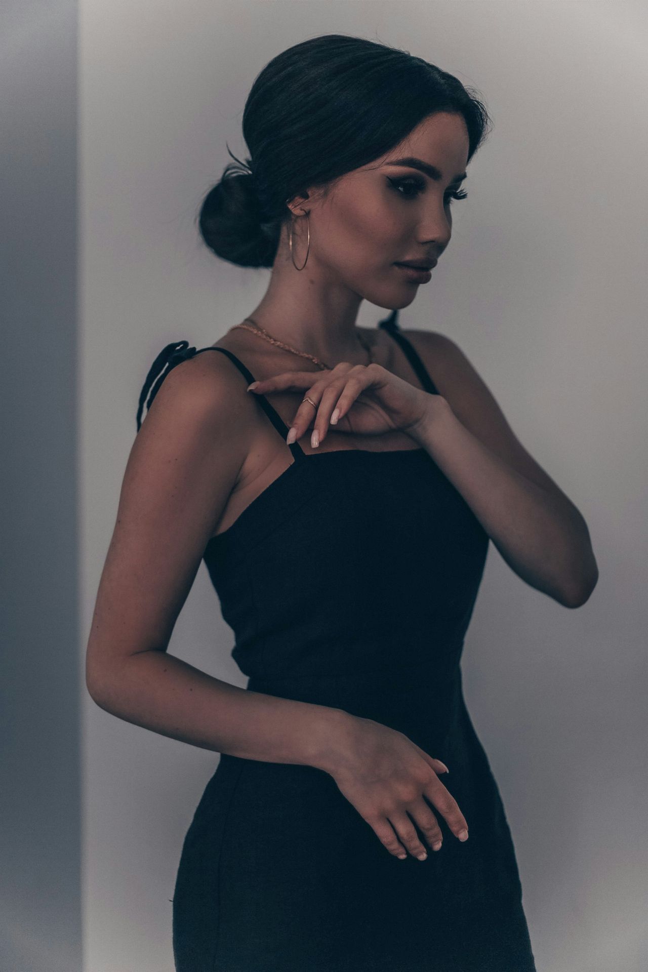 a woman in a black dress